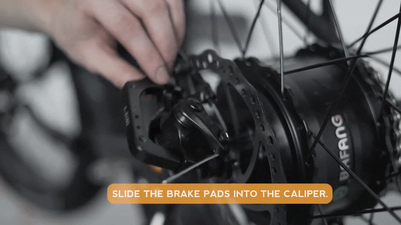 Install brake pads in caliper.gif