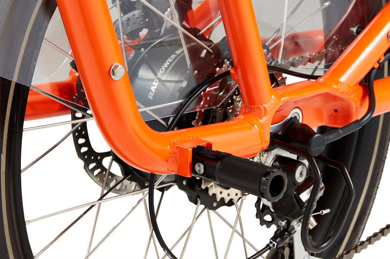 foot pegs on orange bike